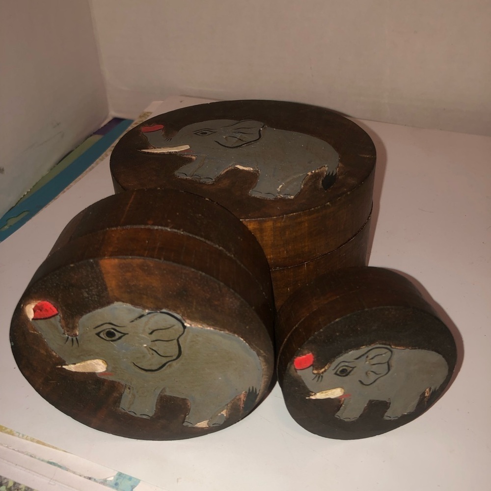 Vintage handcrafted Wooden Elephant Decor Boxes that fit inside of each other